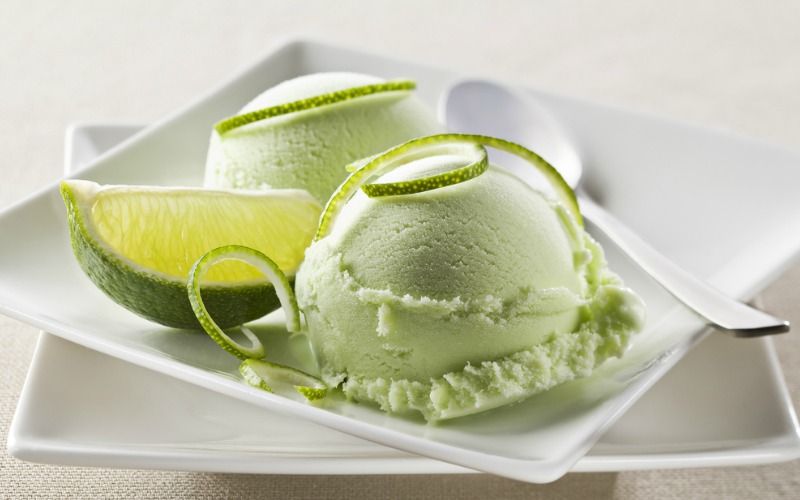 Lime ice cream on a plate.