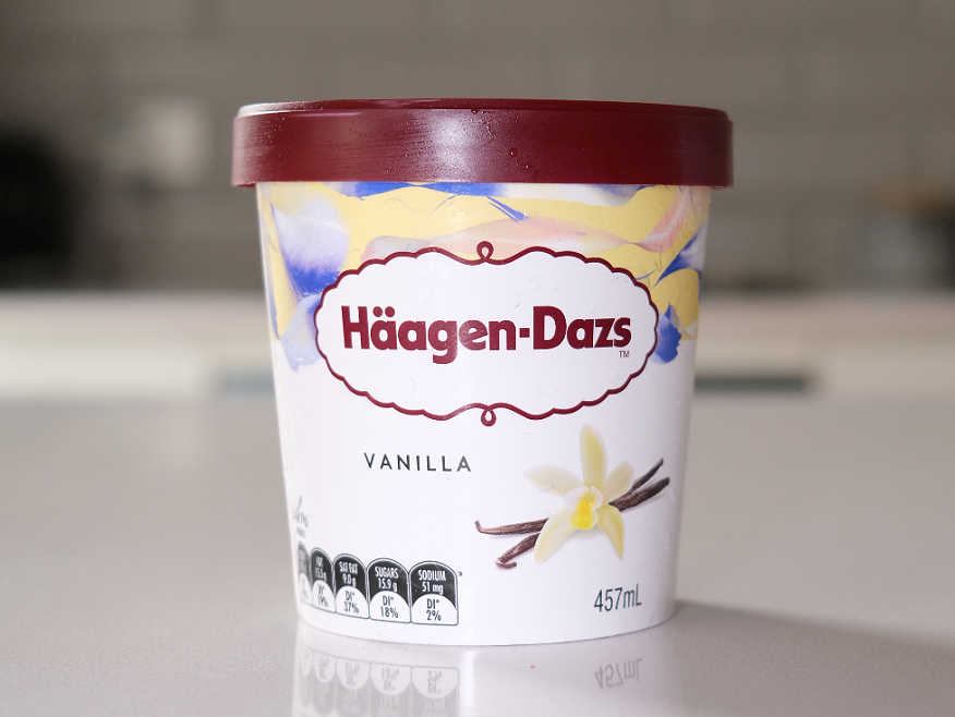 Front of pack shot of Haagen-Dazs Vanilla Ice Cream on a kitchen bench